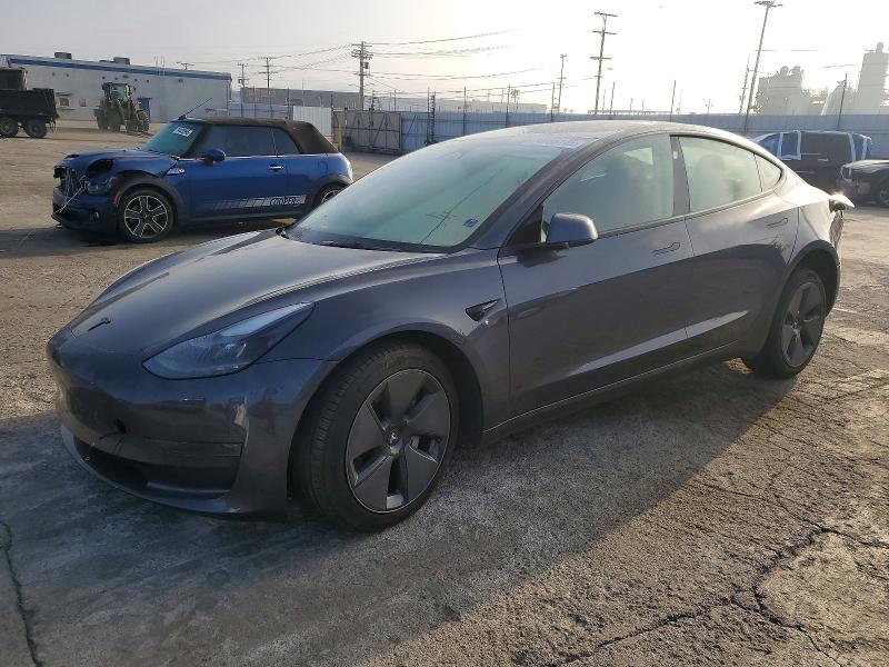 TESLA MODEL 3 2023 with VIN 5YJ3E1EA5PF613667 - Photo from auction
