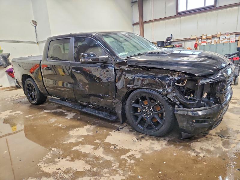 Photo 4 from auction – 2024 RAM 1500 with VIN 1C6SRFVT9RN126854
