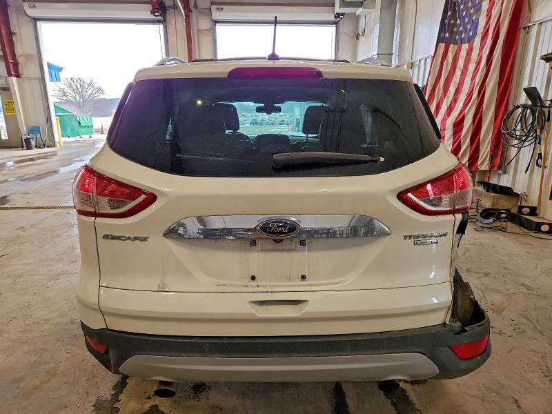 Photo 6 from auction – 2016 FORD ESCAPE TIT with VIN 1FMCU9JX1GUC03754