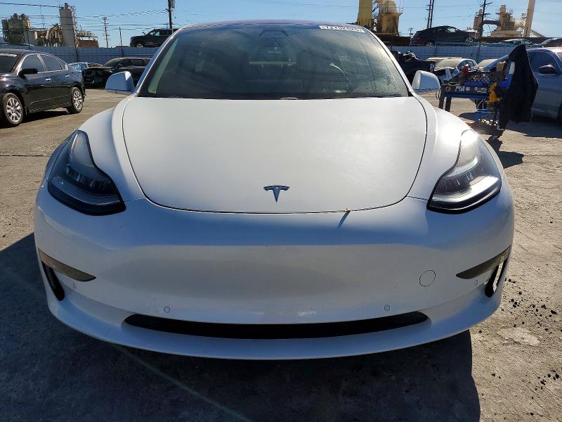 Photo 5 from auction – 2018 TESLA MODEL 3 with VIN 5YJ3E1EA1JF026289