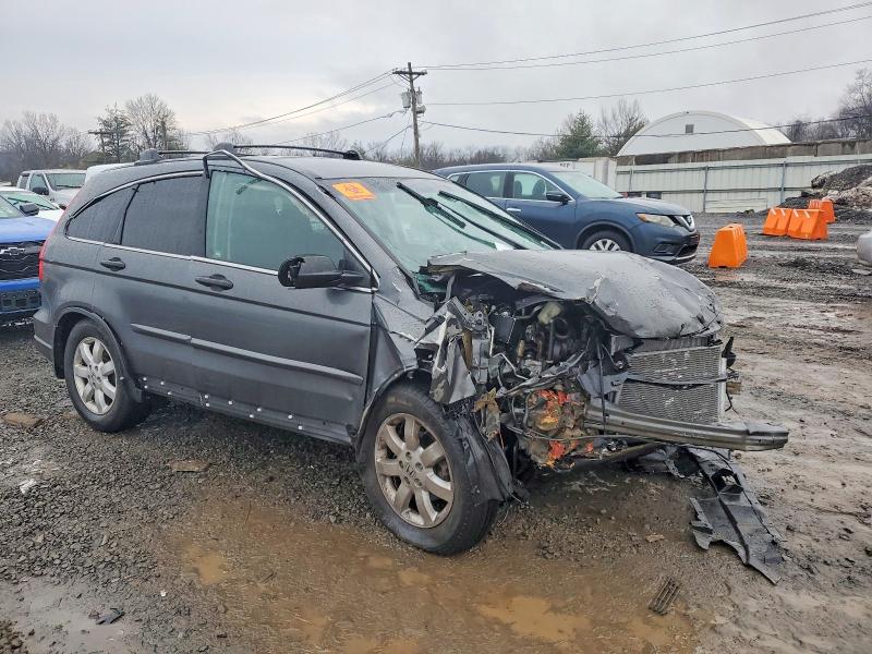 Photo 4 from auction – 2011 HONDA CR-V with VIN 5J6RE4H46BL060402