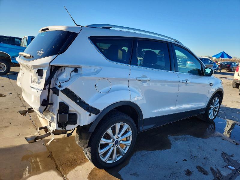 Photo 3 from auction – 2017 FORD ESCAPE TIT with VIN 1FMCU0J98HUB88586