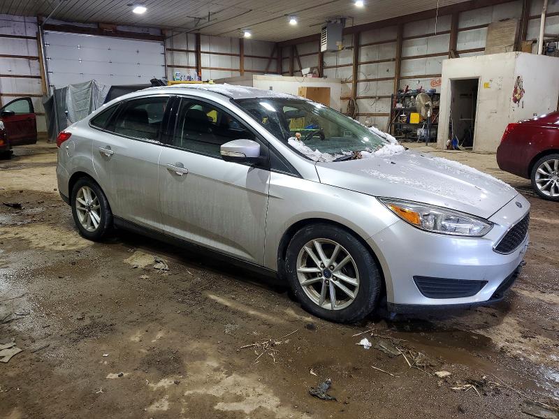 Photo 4 from auction – 2015 FORD FOCUS with VIN 1FADP3F24FL355533