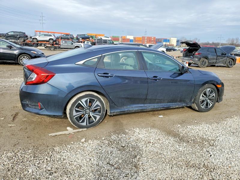 Photo 3 from auction – 2016 HONDA CIVIC with VIN 19XFC1F33GE037232
