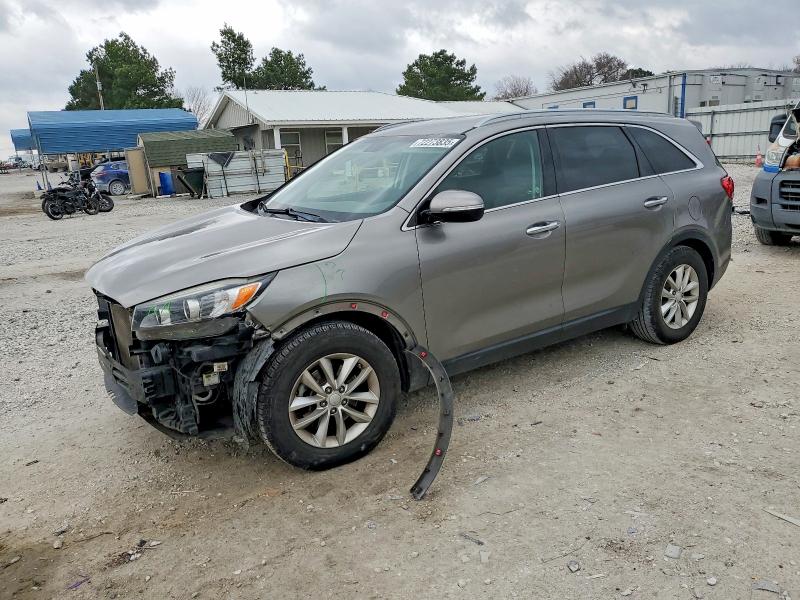 KIA SORENTO LX 2016 with VIN 5XYPG4A53GG036507 - Photo from auction
