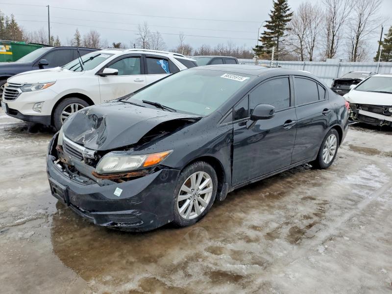 HONDA CIVIC LX 2012 with VIN 2HGFB2F57CH027622 - Photo from auction