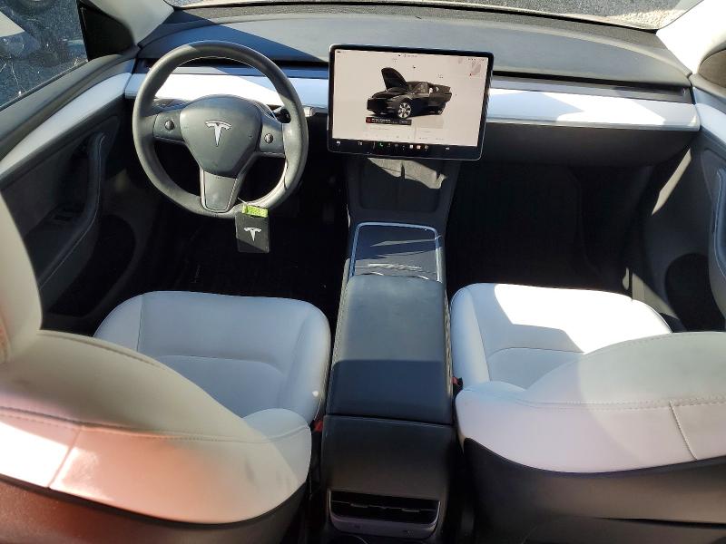 Photo 8 from auction – 2023 TESLA MODEL Y with VIN 7SAYGDEE1PA200729