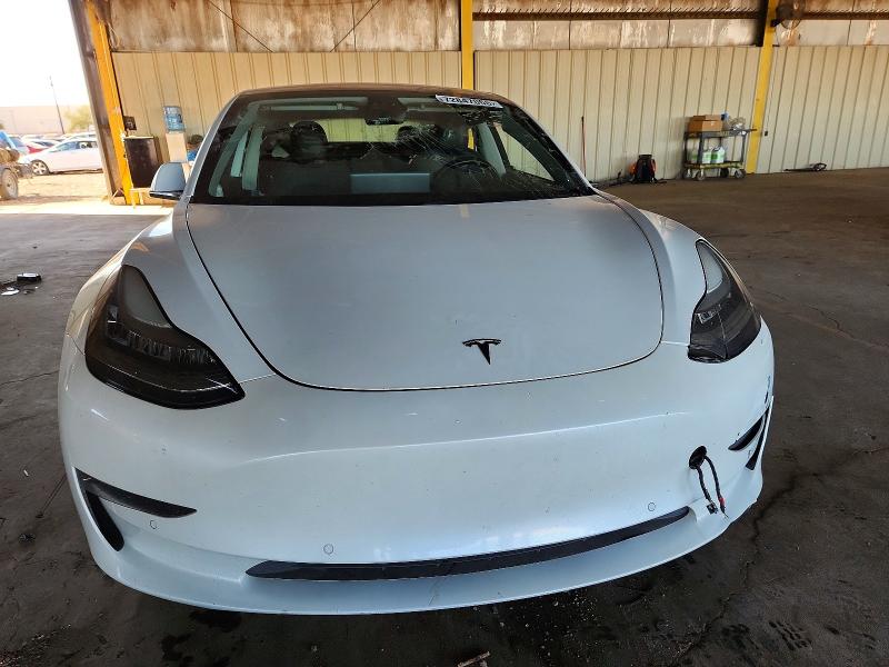 Photo 5 from auction – 2019 TESLA MODEL 3 with VIN 5YJ3E1EA1KF299721