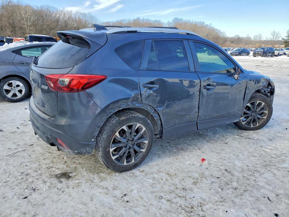 Photo 3 from auction – 2016 MAZDA CX-5 GT with VIN JM3KE2DY9G0855450