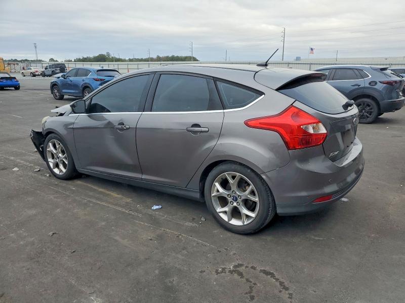 Photo 2 from auction – 2014 FORD FOCUS TITA with VIN 1FADP3N21EL261982