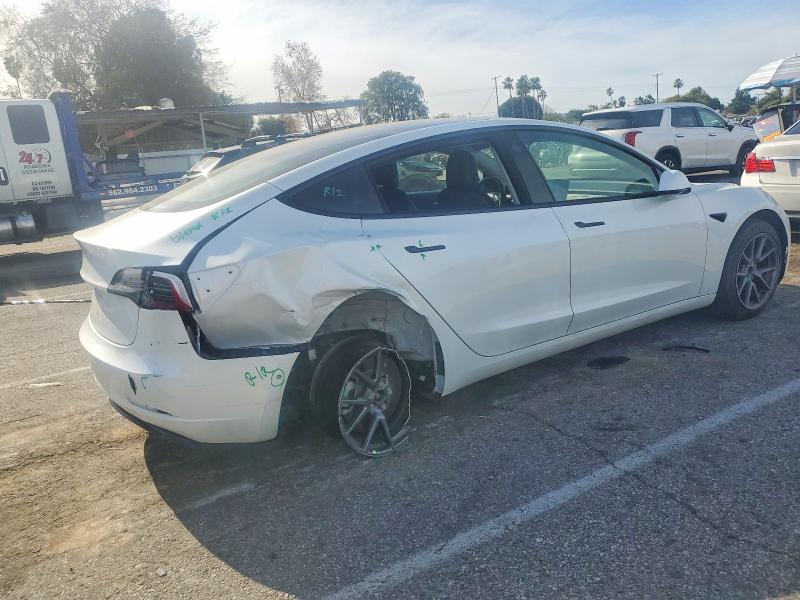 Photo 3 from auction – 2022 TESLA MODEL 3 with VIN 5YJ3E1EA2NF202837