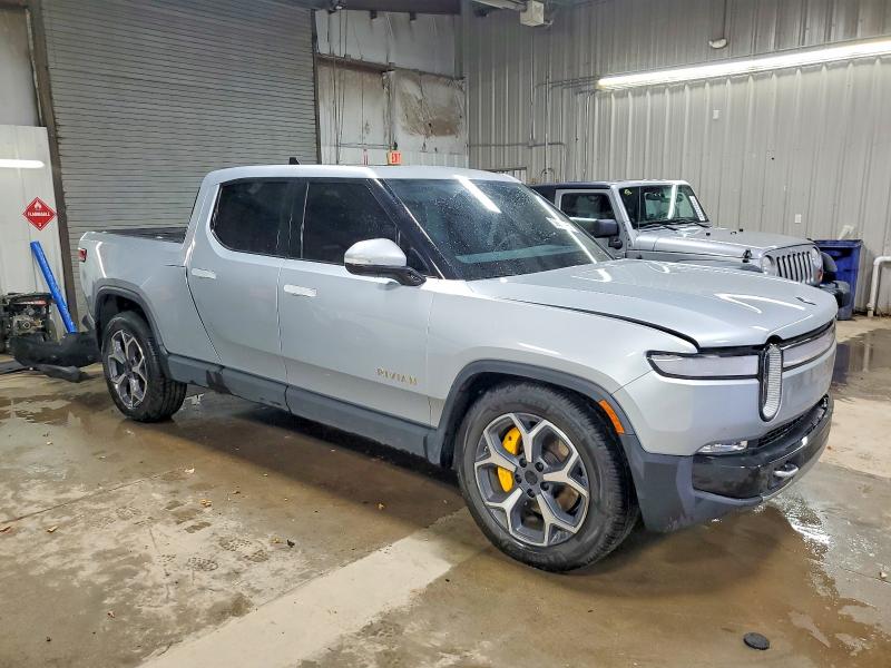 Photo 4 from auction – 2023 RIVIAN R1T with VIN 7FCTGAAA6PN020668