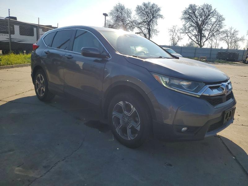 Photo 4 from auction – 2018 HONDA CR-V EX with VIN 7FARW2H54JE010717
