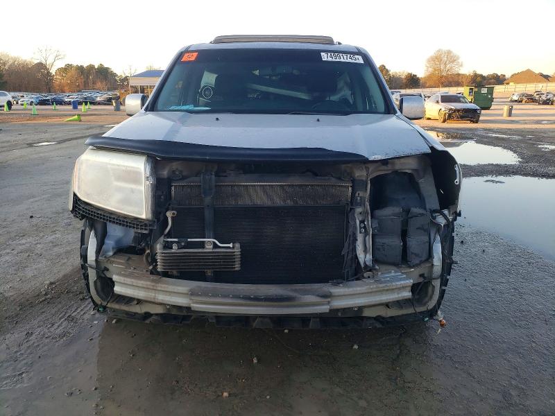 Photo 5 from auction – 2012 HONDA PILOT EXL with VIN 5FNYF4H60CB052381