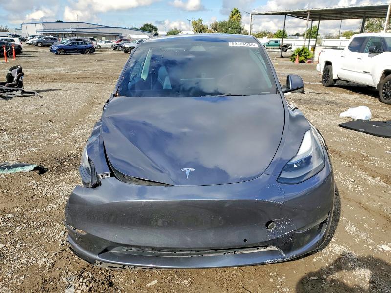 Photo 5 from auction – 2022 TESLA MODEL Y with VIN 7SAYGDEF0NF395554
