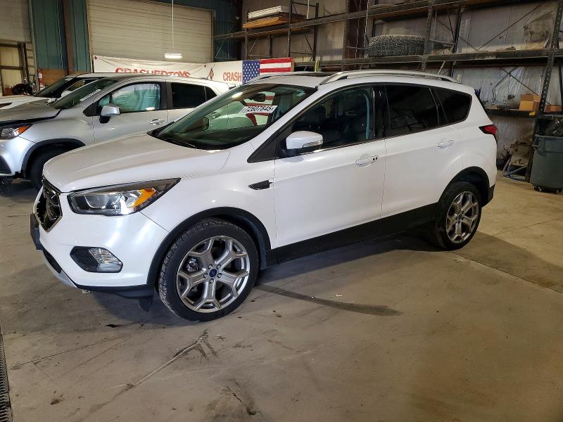 FORD ESCAPE TIT 2017 with VIN 1FMCU9J92HUB74963 - Photo from auction