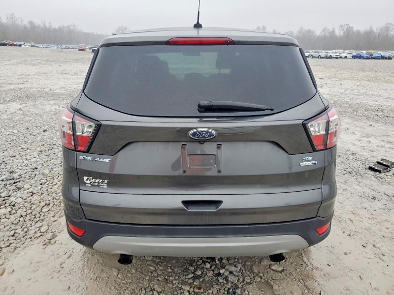 Photo 6 from auction – 2017 FORD ESCAPE SE with VIN 1FMCU9GD8HUD80817