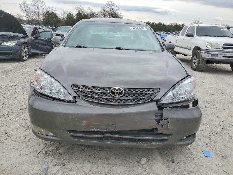 Photo 5 from auction – 2004 TOYOTA CAMRY LE with VIN 4T1BF30K64U570704