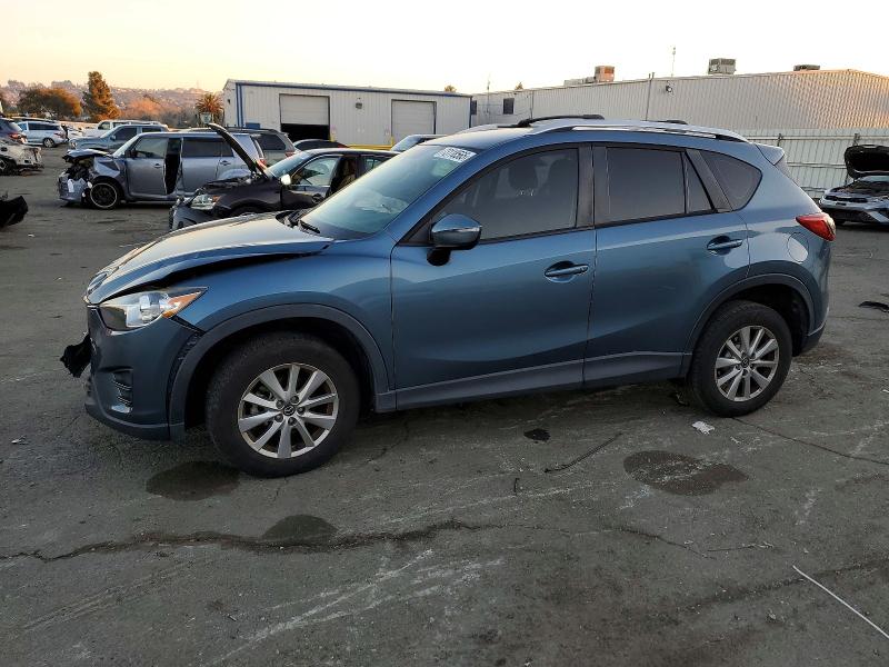MAZDA CX-5 SPORT 2016 with VIN JM3KE2BYXG0876083 - Photo from auction