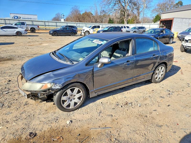 HONDA CIVIC LX 2010 with VIN 19XFA1F55AE037957 - Photo from auction