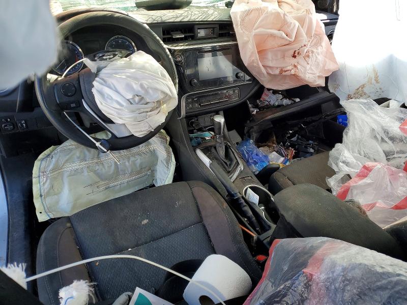 Photo 8 from auction – 2018 TOYOTA COROLLA with VIN 5YFBURHEXJP754175