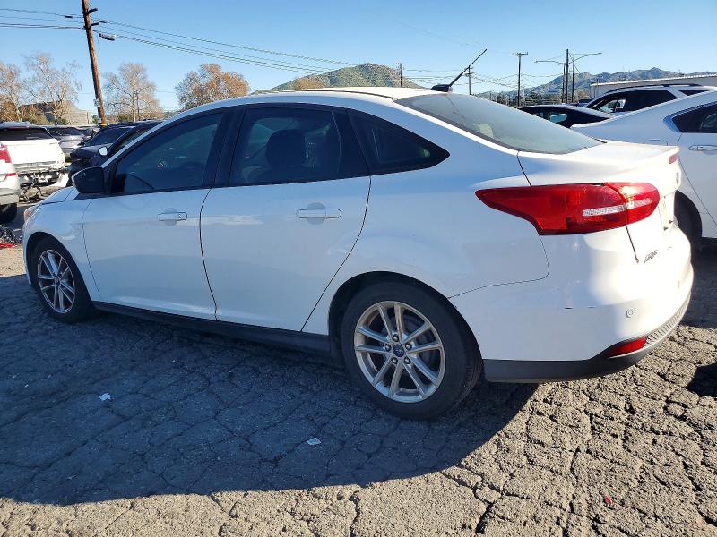 Photo 2 from auction – 2015 FORD FOCUS SE with VIN 1FADP3F25FL221274