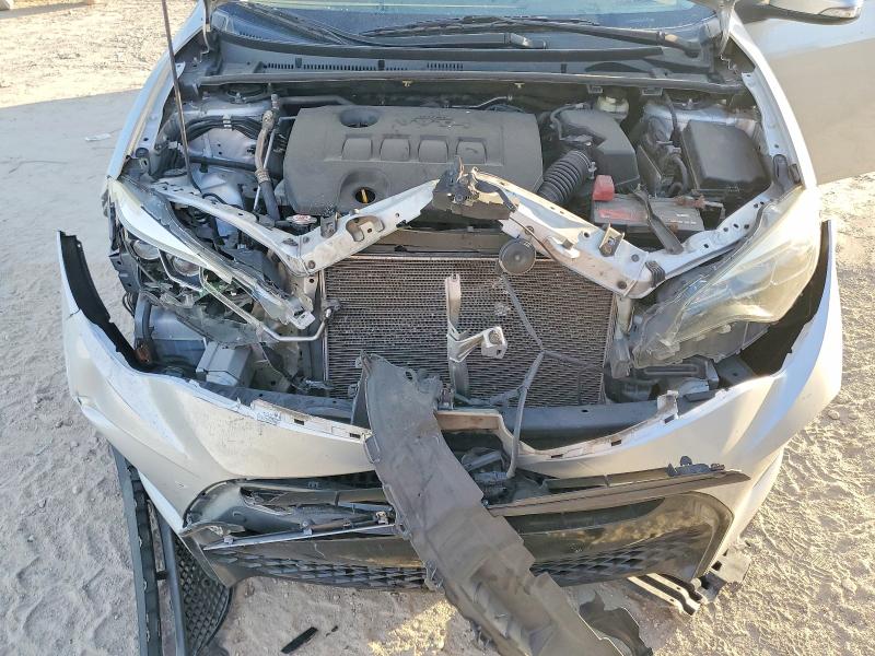 Photo 11 from auction – 2018 TOYOTA COROLLA with VIN 5YFBURHE8JP807150