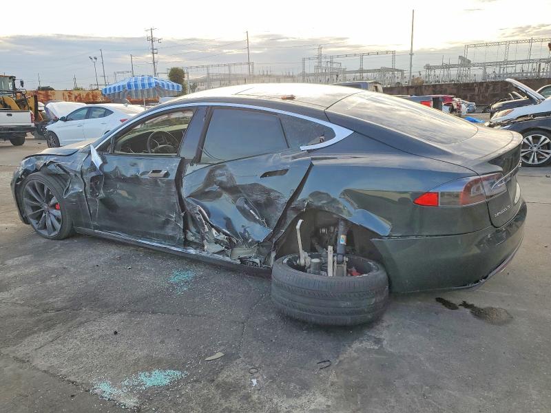 Photo 2 from auction – 2014 TESLA MODEL S with VIN 5YJSA1H16EFP33011