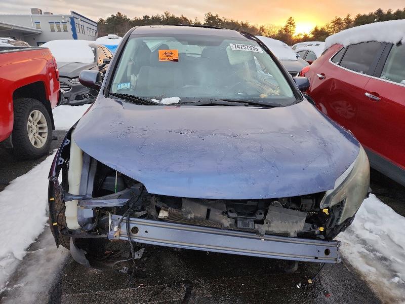 Photo 5 from auction – 2014 HONDA CR-V with VIN 2HKRM4H53EH665018