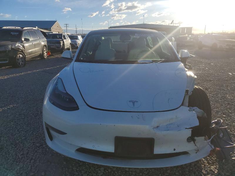 Photo 5 from auction – 2021 TESLA MODEL 3 with VIN 5YJ3E1EB2MF999372
