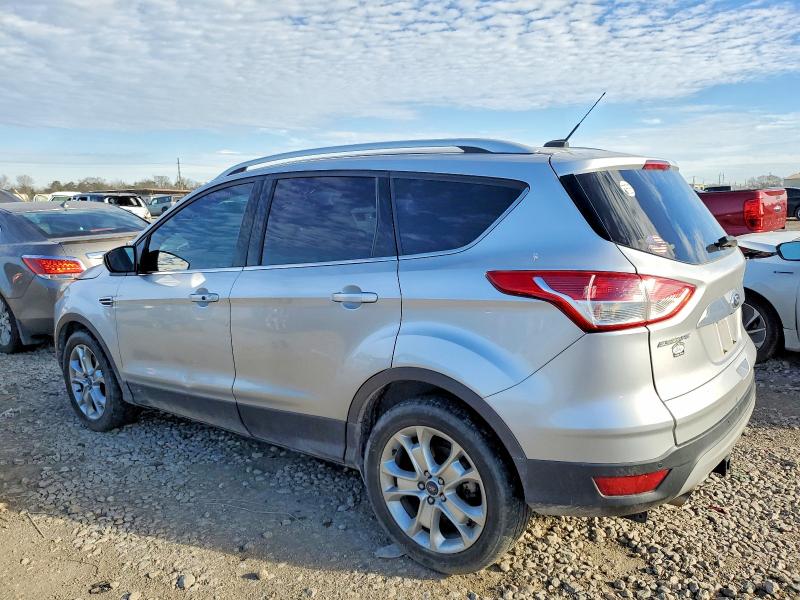 Photo 2 from auction – 2016 FORD ESCAPE TIT with VIN 1FMCU9J97GUA69933