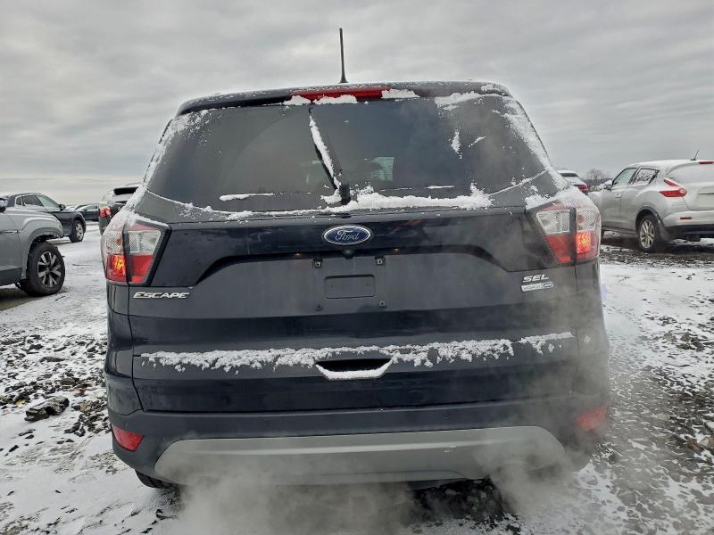 Photo 6 from auction – 2018 FORD ESCAPE SEL with VIN 1FMCU9HD1JUA87894