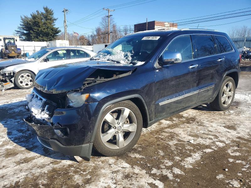 JEEP GRAND CHER 2011 with VIN 1J4RR6GT4BC577240 - Photo from auction