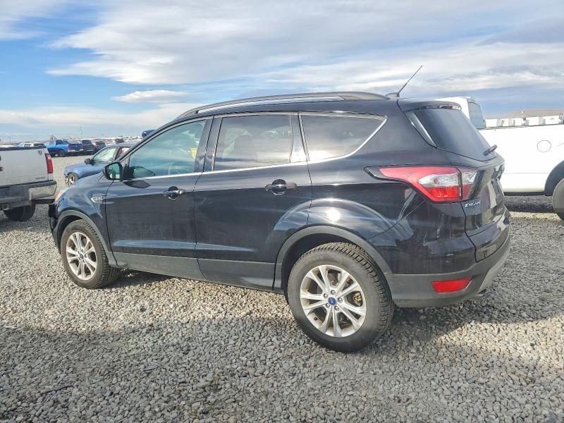 Photo 2 from auction – 2018 FORD ESCAPE SE with VIN 1FMCU9GD9JUC61857