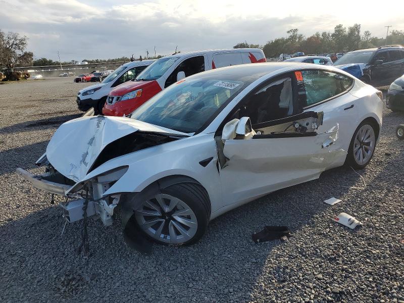 TESLA MODEL 3 2022 with VIN 5YJ3E1EA5NF352179 - Photo from auction