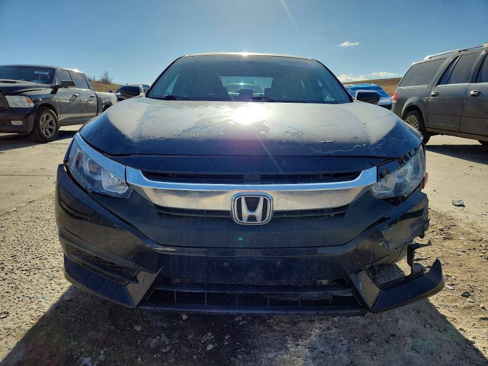 Photo 5 from auction – 2016 HONDA CIVIC with VIN 19XFC2F54GE052474