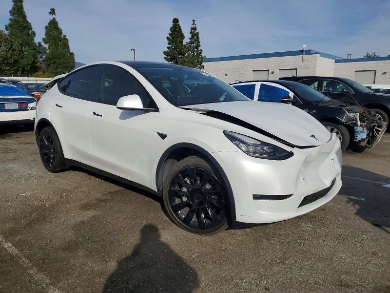 Photo 4 from auction – 2023 TESLA MODEL Y with VIN 7SAYGDEE0PA113565