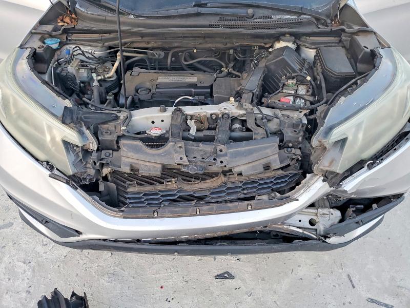 Photo 12 from auction – 2015 HONDA CR-V with VIN 2HKRM3H39FH504375