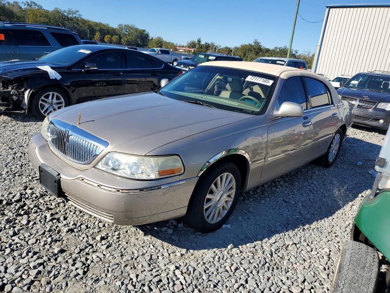 LINCOLN TOWN CAR E 2003 with VIN 1LNHM81W83Y687299 - Photo from auction