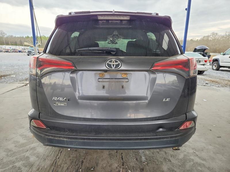Photo 6 from auction – 2018 TOYOTA RAV4 with VIN JTMZFREV6JJ177520