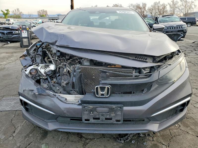 Photo 5 from auction – 2019 HONDA CIVIC with VIN 19XFC2F61KE212375