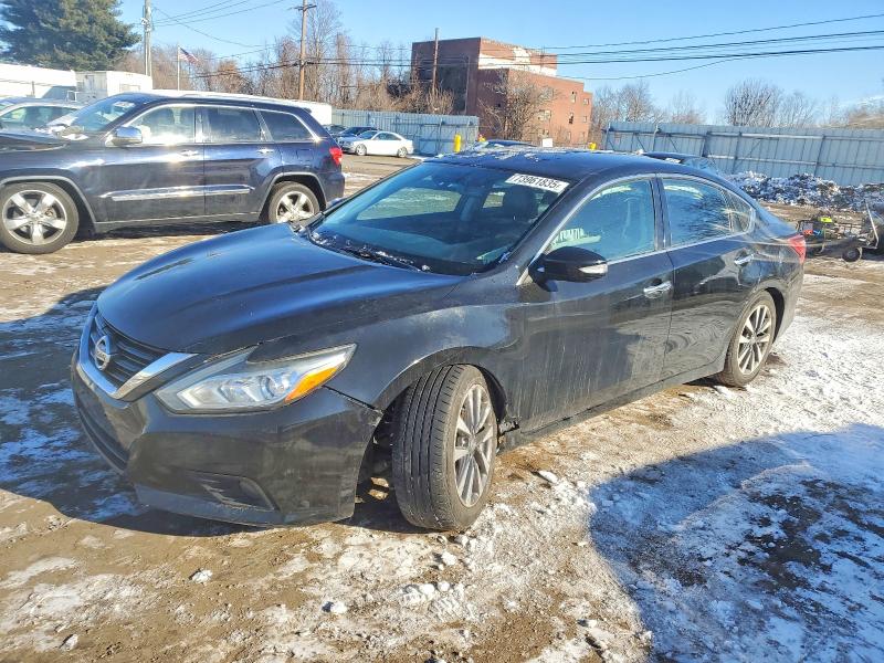 NISSAN ALTIMA 2.5 2017 with VIN 1N4AL3AP1HC170344 - Photo from auction