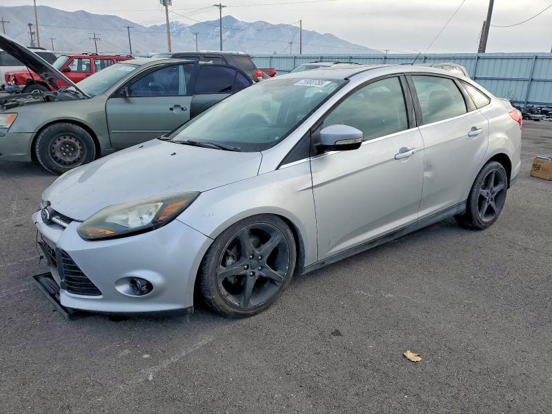 FORD FOCUS 2014 with VIN 1FADP3J28EL219573 - Photo from auction