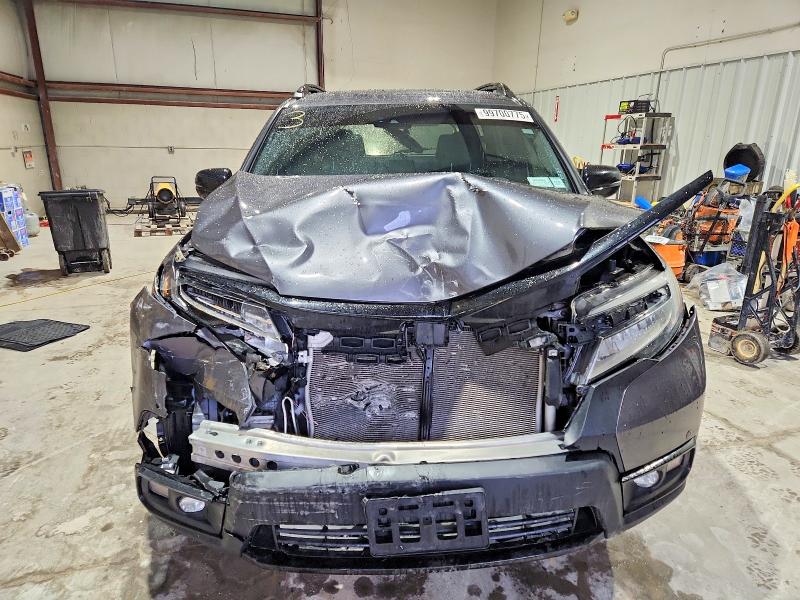 Photo 5 from auction – 2021 HONDA PASSPORT E with VIN 5FNYF8H03MB010663