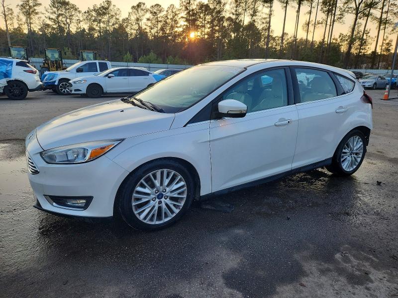 FORD FOCUS TITA 2016 with VIN 1FADP3N23GL307086 - Photo from auction