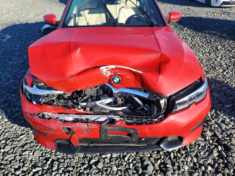 Photo 11 from auction – 2019 BMW 330I with VIN WBA5R1C54KAK09468