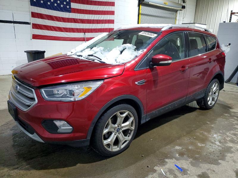 FORD ESCAPE 2019 with VIN 1FMCU9J91KUB73326 - Photo from auction