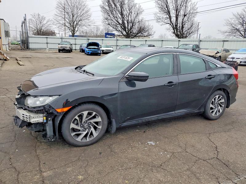 Photo 1 from auction – 2018 HONDA CIVIC EX with VIN 19XFC2F78JE009829