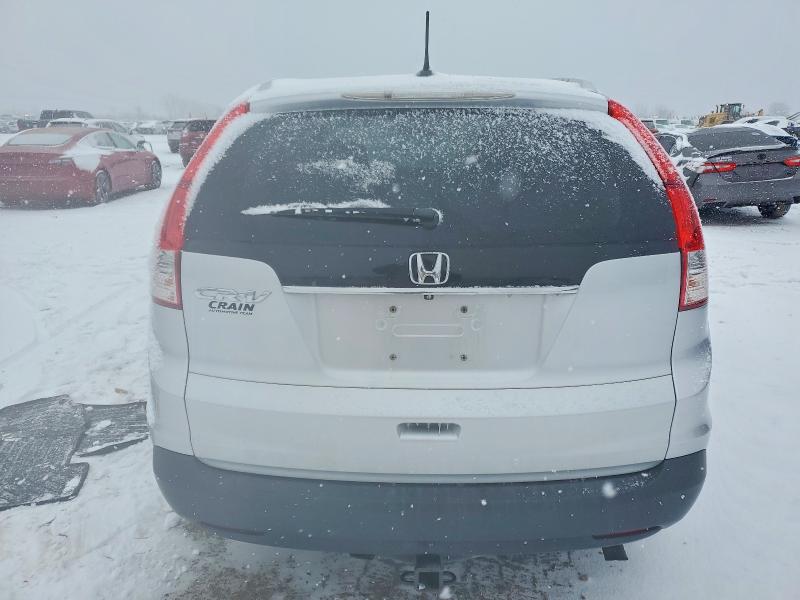Photo 6 from auction – 2014 HONDA CR-V EXL with VIN 2HKRM3H72EH554701