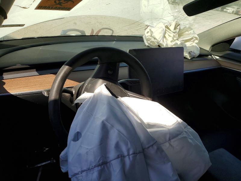 Photo 8 from auction – 2023 TESLA MODEL 3 with VIN 5YJ3E1EA5PF614768
